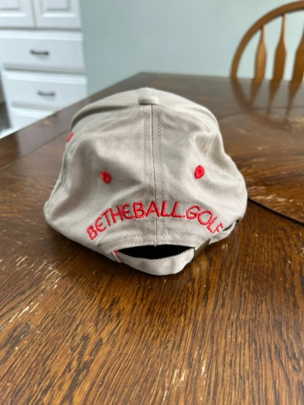 BE THE BALL Golf Cap with adjustable strap - $19